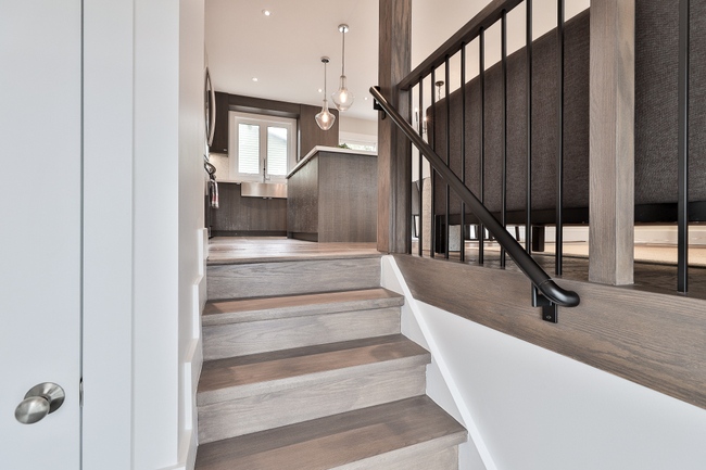 This bungalow has a sunken dining and living room space, which is such a unique feature to highlight. The open concept of this design makes for easy breezy living and accessibility to the homeowners. ⁠
⁠⁠
For more on our design and build process, visit: kikiphukandesign.com