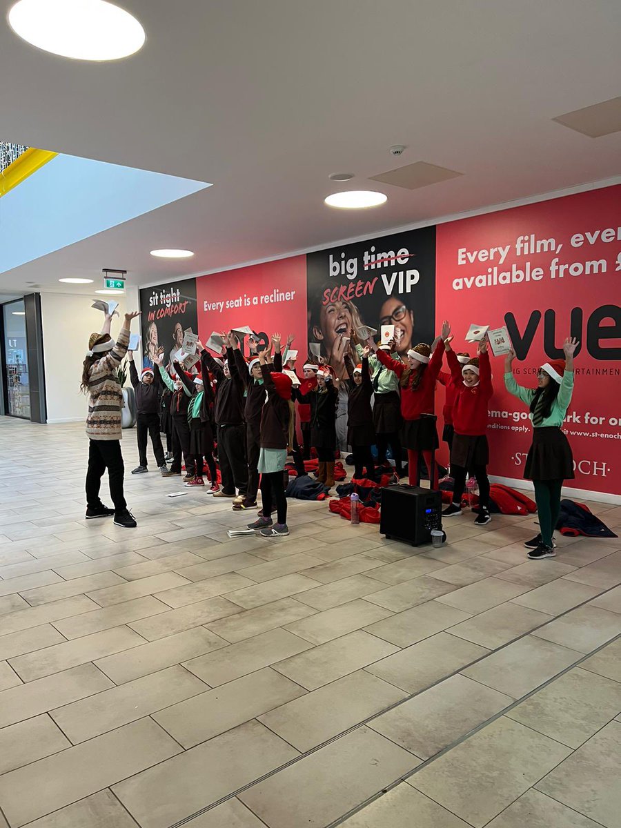 HeatherPPWH's tweet photo. Having great fun this week carol singing with some local primary schools at @StEnochCentre.  Come by and give them a cheer if you’re passing!  Here is @St_Denis_PS kicking off the week 🎄🎅🏻 https://t.co/Fr2vdCvkeR
