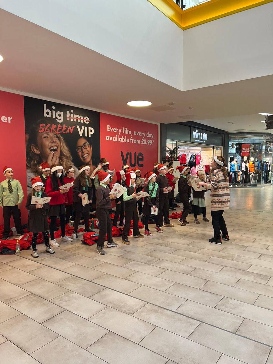HeatherPPWH's tweet photo. Having great fun this week carol singing with some local primary schools at @StEnochCentre.  Come by and give them a cheer if you’re passing!  Here is @St_Denis_PS kicking off the week 🎄🎅🏻 https://t.co/Fr2vdCvkeR