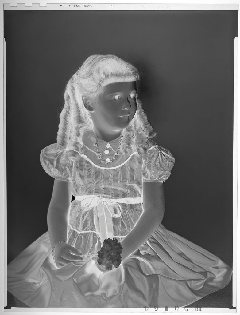 harvard_art_bot's tweet photo. Untitled (portrait of girl with ringlets in dress, seated, holding carnation) - (c. 1955) Paul Gittings | Negative, gelatin silver (film) | 4.2002.12595 https://t.co/rMs8FpM1Dd