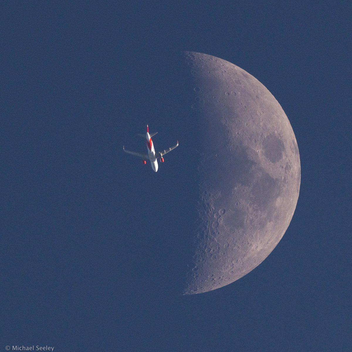 MikeSeeley's tweet photo. An @Airbus A320 passes in front of the un-illuminated side of the 42% illuminated Moon, seen Tuesday from the Space Coast. 

That's @AviancaNAM flight 247 traveling from Washington, DC (IAD) to Bogota, Columbia (BOG) at 34k feet &amp; 472kts.

(📷:me, flight data by @flightradar24) https://t.co/w8EAZut93x