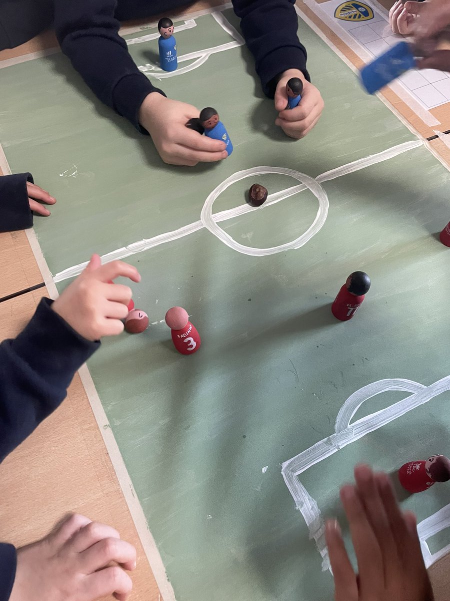 Introducing… peg doll football ⚽️ based on the favourite teams of the children in my class <a href="/LFC/">Liverpool FC</a> and <a href="/LUFC/">Leeds United</a> ❤️💙 They used strategising skills to plan player positions and moves alongside subitising to keep track of score! The talk that came from this too was just brilliant ✨