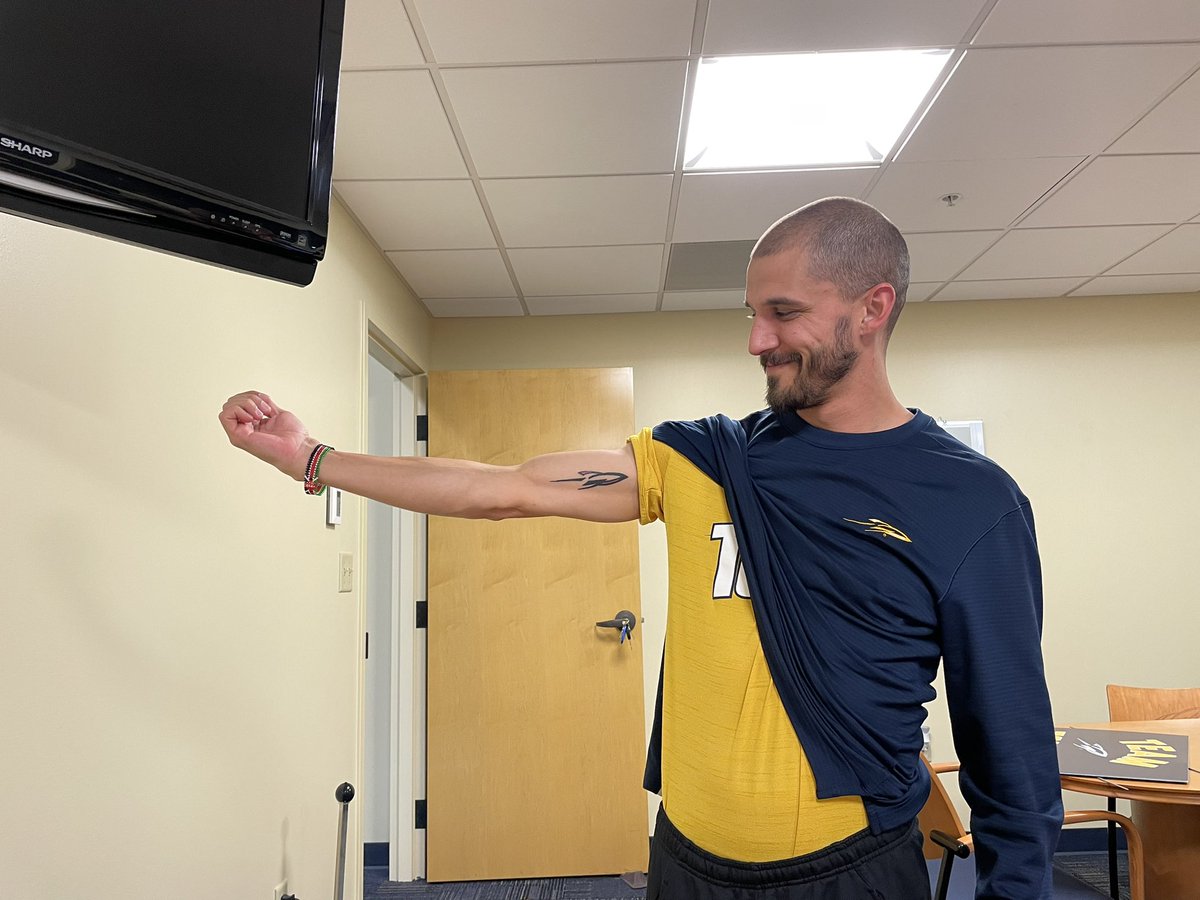 BtotheBlair's tweet photo. Many people say they’re all in, but other show it.

S/O to @nstenuf for keeping his promise to @ToledoXCTF!

I wonder what @ToledoRockets feat it would take for me to get such a tattoo?!?! 🤔🚀

#GoRockets x #TeamToledo https://t.co/ekxqqqCaRN