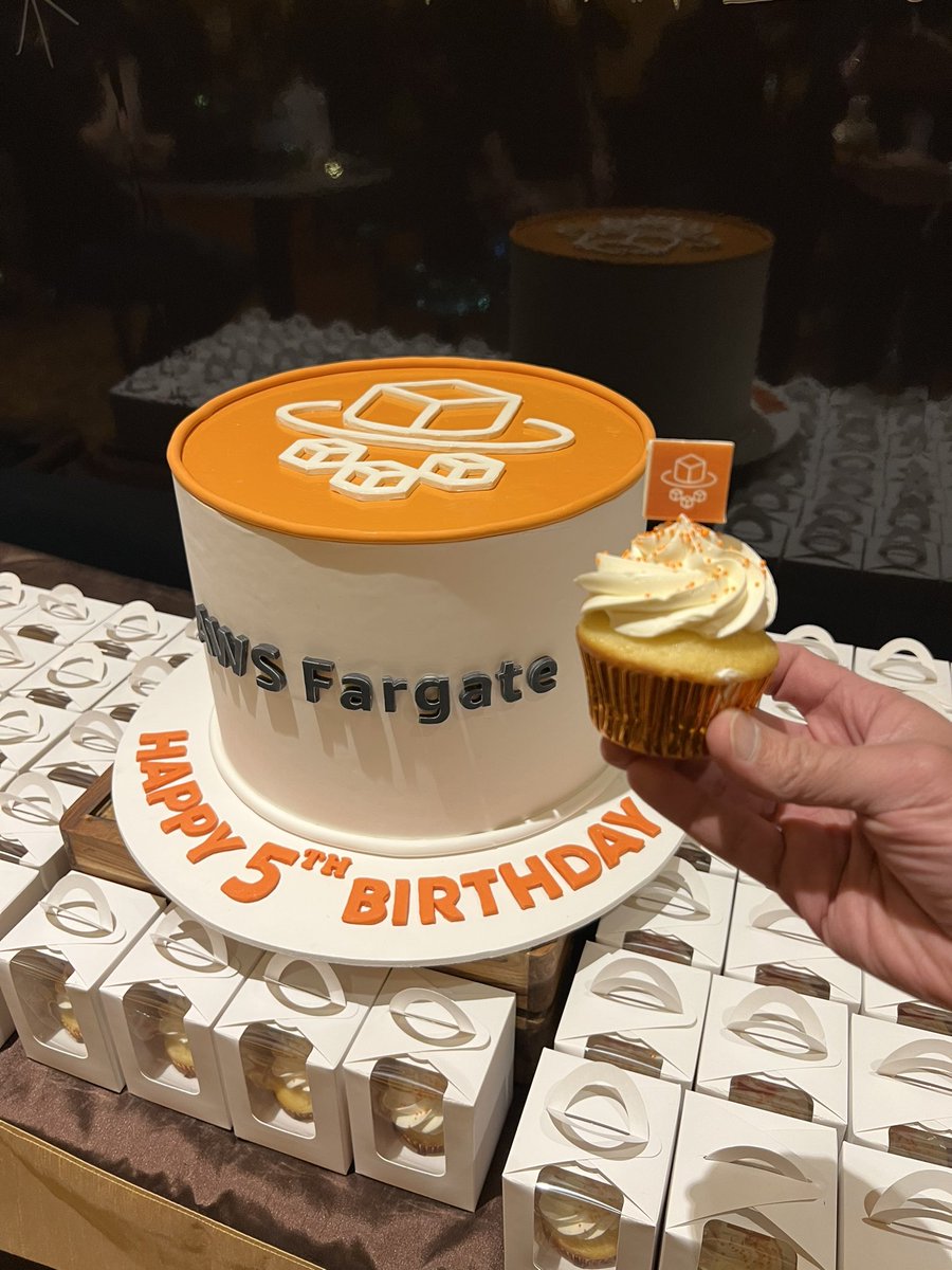 Celebrating AWS Fargate’s 5th birthday in the Modern Applications and Open Source zone at #reInvent! Come get your birthday cake while it lasts. <a href="/omieomye/">Omar Paul</a> made me wear the hat so he had to get in the photo.