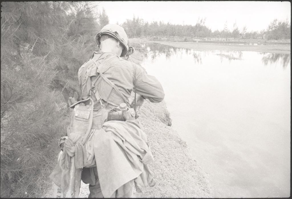 harvard_art_bot's tweet photo. Untitled (soldier walking on path next to river(?), Vietnam) - (1967-68) Gordon W. Gahan | Negative, gelatin silver (35mm film) | 2007.184.2.73.2 https://t.co/yQTtSTVzvP