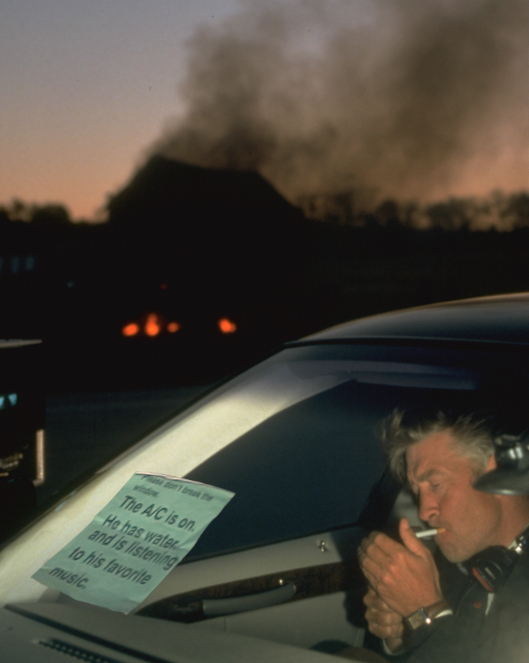 I've seen a lot of people posting that press photo of Cronenberg sitting in the car from Crash lately so I figured I'd share this one of David Lynch on the set