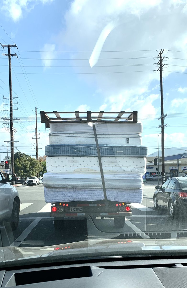 Driving behind the bus and truck of Once Upon a Mattress this morning.