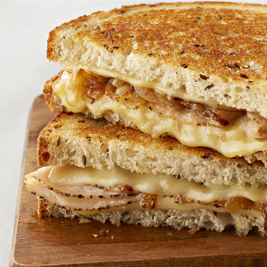 Thanksgiving dinner is great, but with our help, your leftovers can be even better. Learn how to use some leftover turkey in this gooey, grilled Swiss cheese, turkey & onion sandwich at the link in bio.