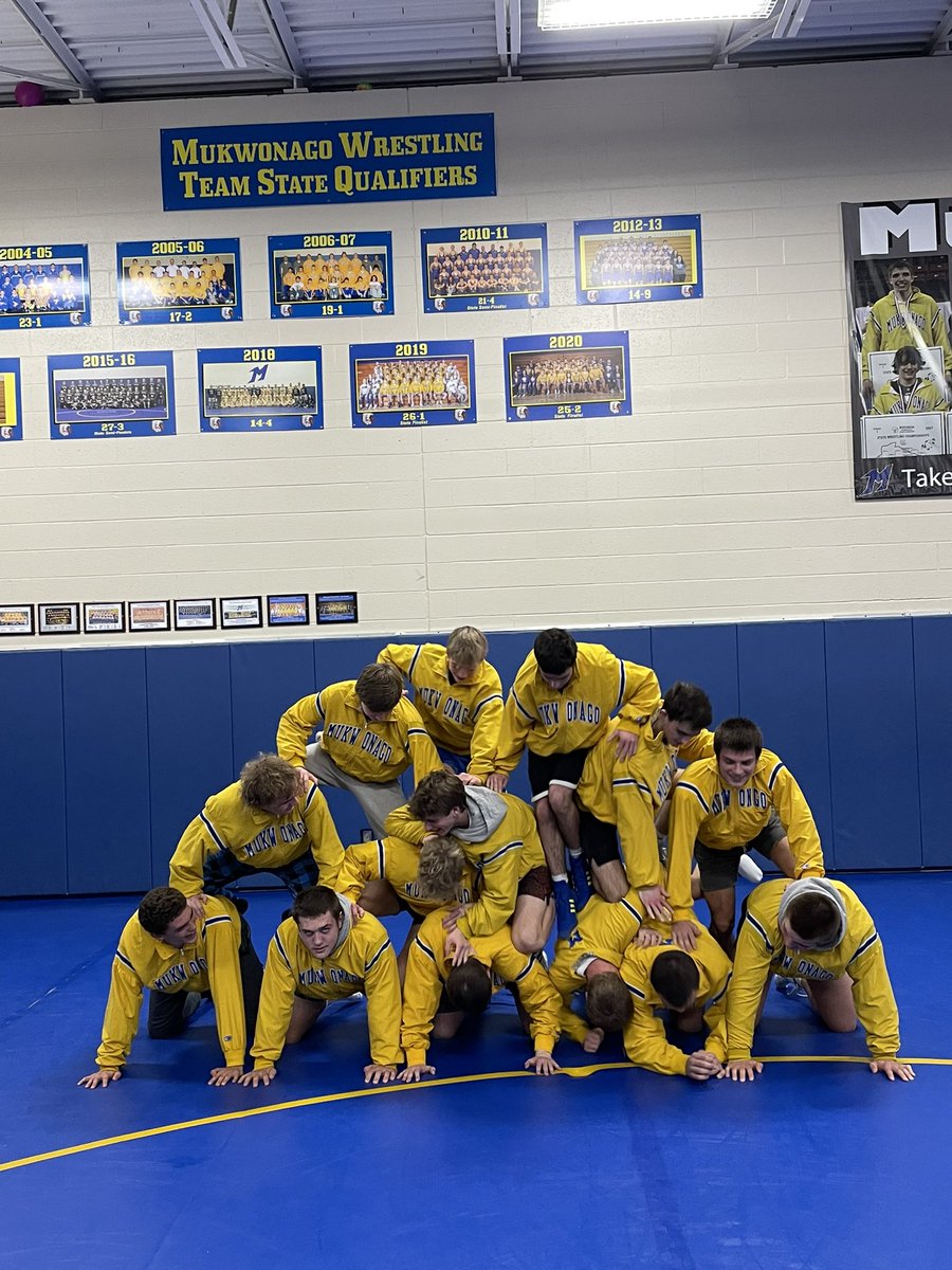 Tonight’s 2022 Blue/Gold wrestle-off winners.  The tradition of distributing the Gold Jackets and building the pyramid in front of the Team State Wall!  

Home opener on Thursday 12/1-Waukesha South at 6:00 &amp; Oconomowoc 7:30 in North gym! 

#BuildingOnTradition