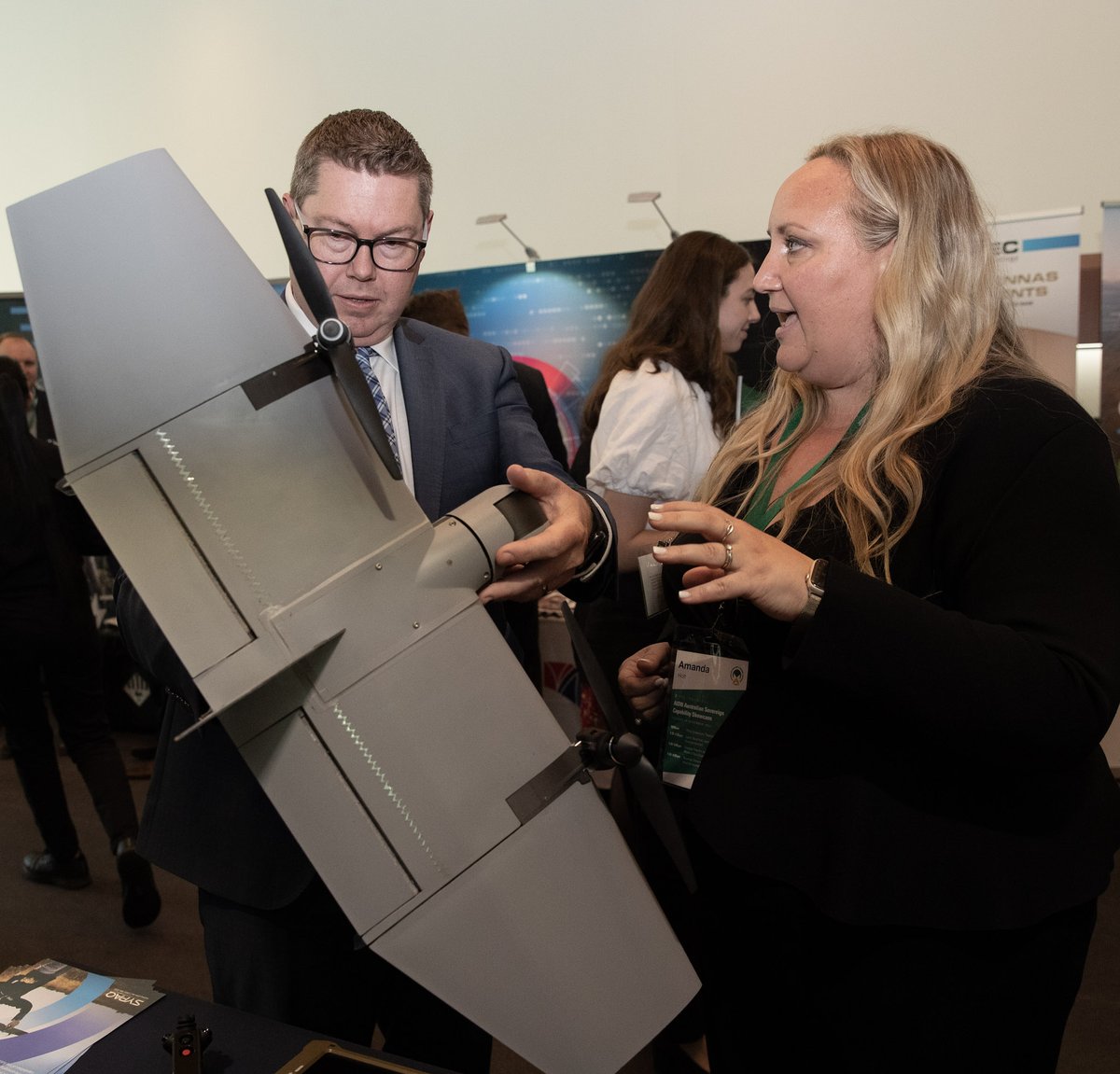 PatConroy1's tweet photo. Encouraging to see innovative Australian #DefenceIndustry—from electrified Bushmasters, to disposable drones, to lightweight helmets, to watercraft with almost half the usual slam load. All at the inaugural AIDN Australian #SovereignCapability Showcase and Policy Symposium. https://t.co/6ICtM4WvQL