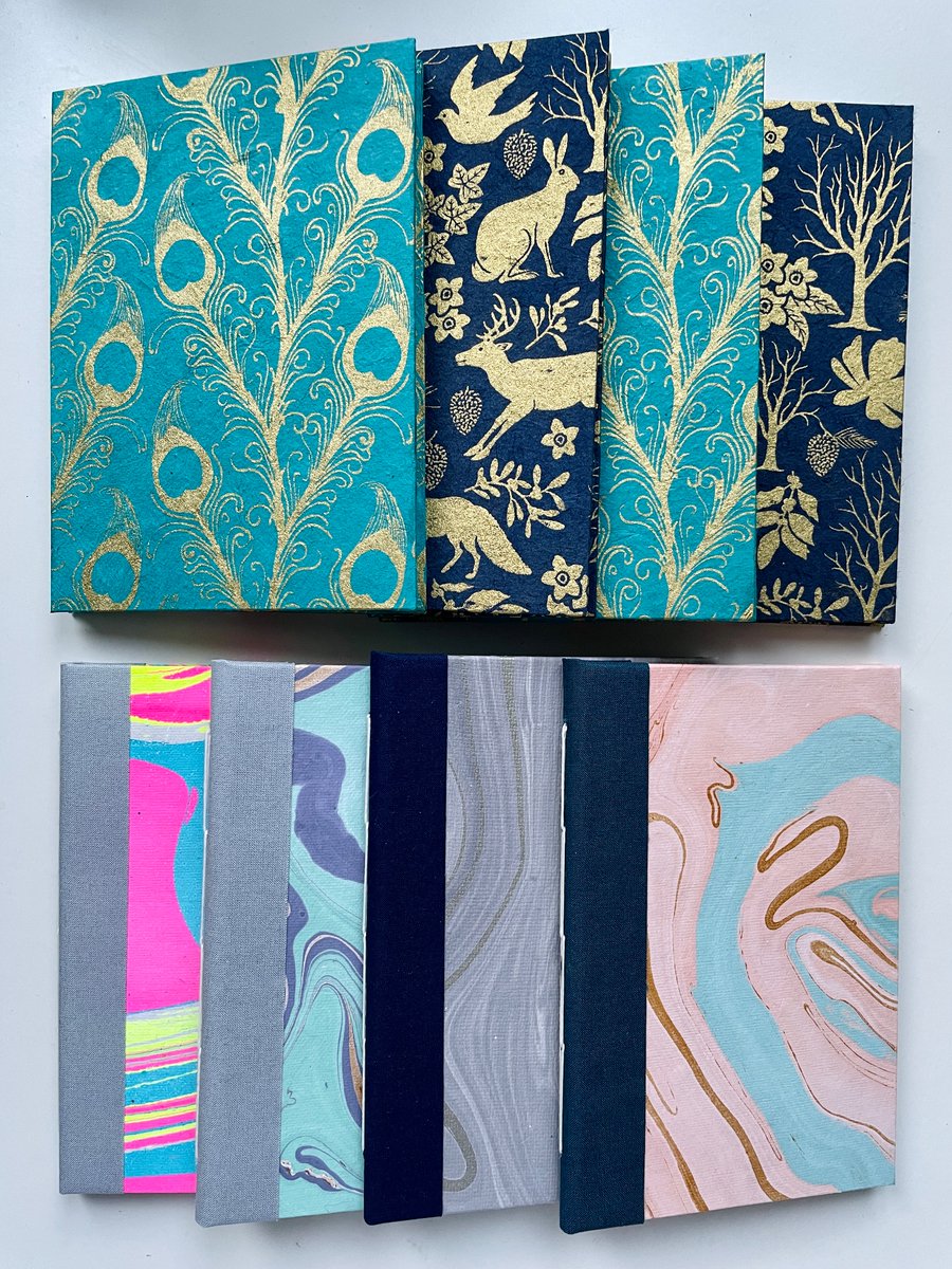craftyvarda's tweet photo. Some #handmadebooks for upcoming #christmasmarkets in Glasgow! All handmade with #sustainable materials. Market info coming soon! 🌲✨📚 https://t.co/EonMifXs4Z