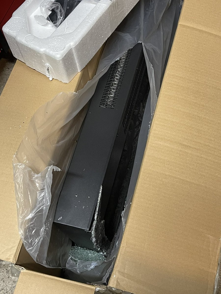 TylerLeeGorman's tweet photo. Shout to to @FedEx for breaking my fireplace. She handles the package well walking up but you can hear the glass as she sets it down and slides it https://t.co/rxv5sydtP2