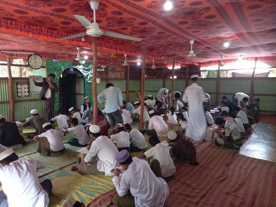 arakan_express's tweet photo. The Rohingya Youth Association (RYA) has teamed up with educated Rohingya youth teachers and Islamic religious teachers to start teaching Burmese and English with Burmese curriculum along with Arabic in an Arabic school (madrasa) in Rohingya Refugee camp.

https://t.co/WTPu9ULyvq https://t.co/IDcJFxH1pn