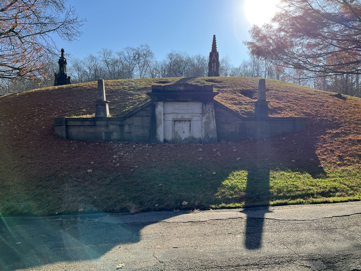 A mausoleum tucked into a hill. Allegheny Cemetery. #cemeteries