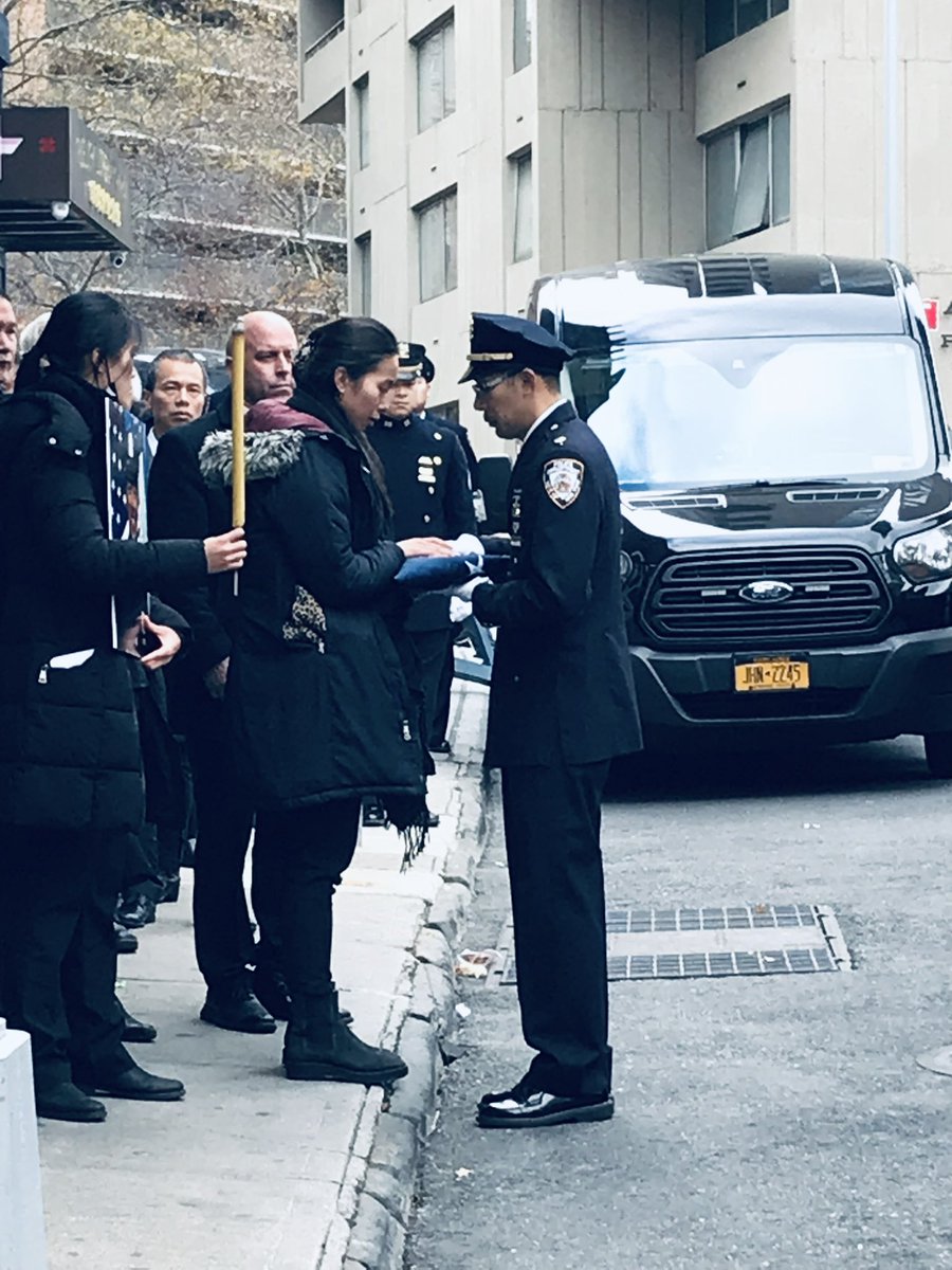 NYPDCeremonial's tweet photo. Active Police Officer Stephen Chen from the @NYPD62Pct sadly passed away on 11/21/22. Today Police Officer Chen’s family was presented with our Department Flag in his honor. May he rest in eternal peace. #NeverForget 
@NYPDnews https://t.co/BVCLqhFioy