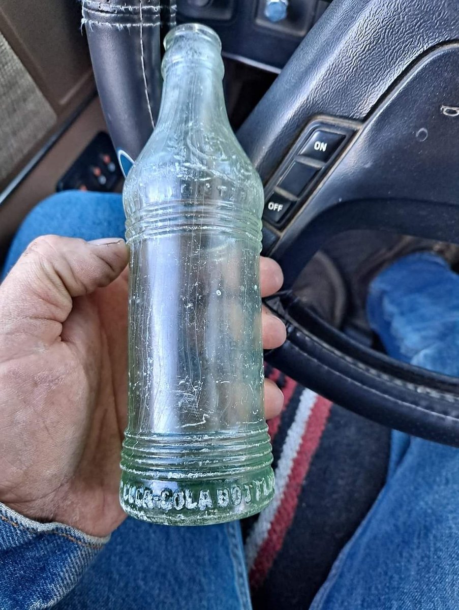 Er1ckOh's tweet photo. @CocaCola I can't find any information on how old or rare this cool coca cola bottle I found is. Help me out any ideas? https://t.co/v30XMhKwya