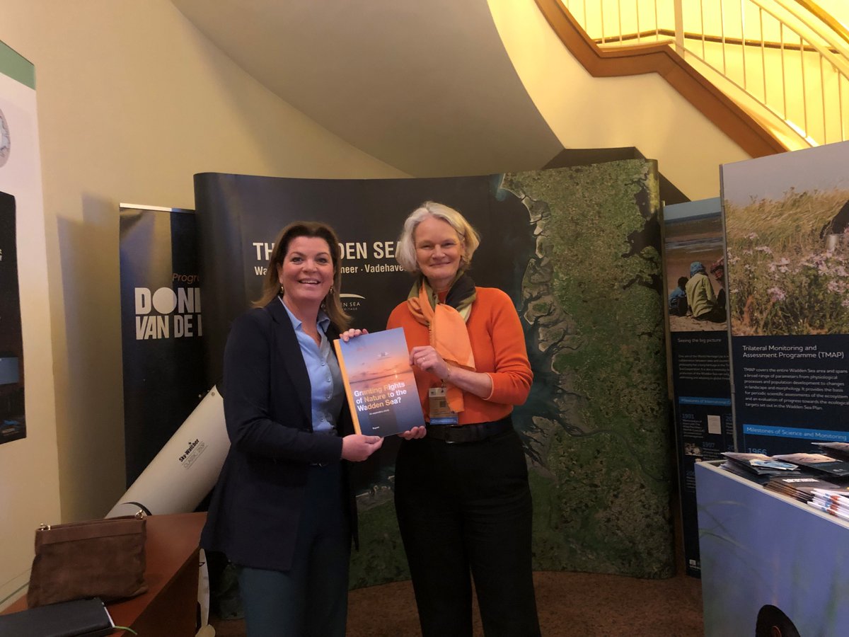 Waddenacademie's tweet photo. Granting Rights of Nature to the #Wadden Sea? An exploratory study by prof. Tineke Lambooy @NyenrodeBU was published today at the 14th Trilateral Governmental Conference #TGC2022 @WaddenseaUNESCO. Katja Philippart handed the first copy to @MinisterNenS https://t.co/GxzZKW6rPs