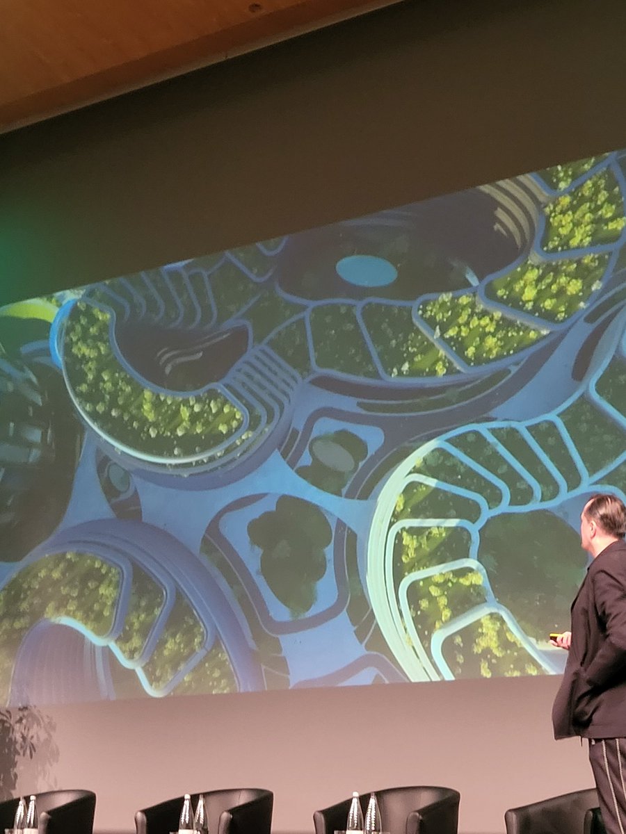 JamesNason's tweet photo. Fascinating presentation by Patrick Schumacher from Zaha Hadid Architects talking about the need to further densify cities (eg. London) and greening campuses #rebuildingEurope https://t.co/p5nGgD6ar6