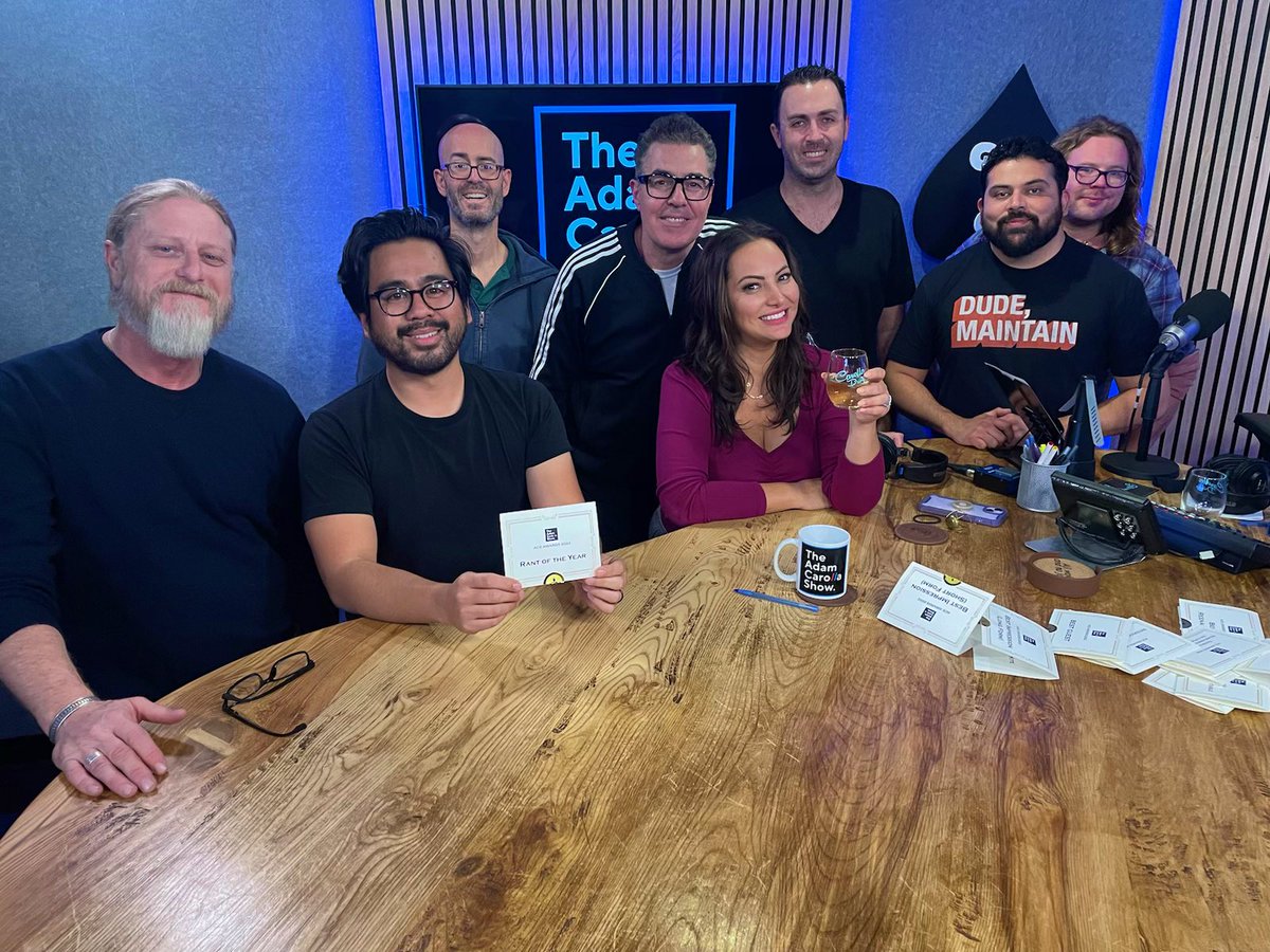 GinaGrad's tweet photo. Happy holidays from the @AdamCarollaShow. Thanks for a great year, everyone! 🥂 https://t.co/7ooqcxCnJk