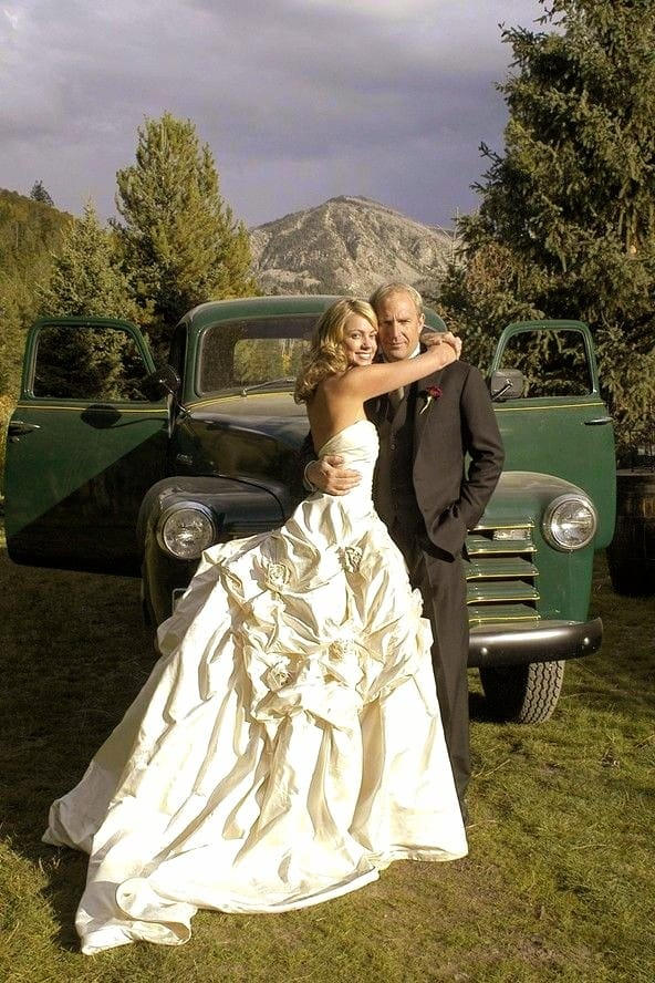 Kevin Costner and Christine Baumgartner on their wedding day, September 25, 2004, in Aspen, CO. They have 3 children together, Hayes, Cayden and Grace