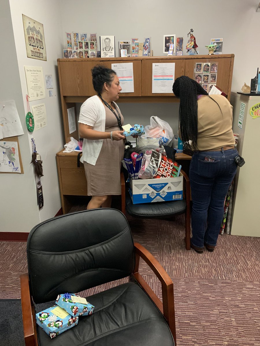 Celenadarling's tweet photo. Santa’s helpers Cheryl Smith and Dr. Roberson helped wrapped the gifts. Thanks ladies. https://t.co/POGGTuGZ5x