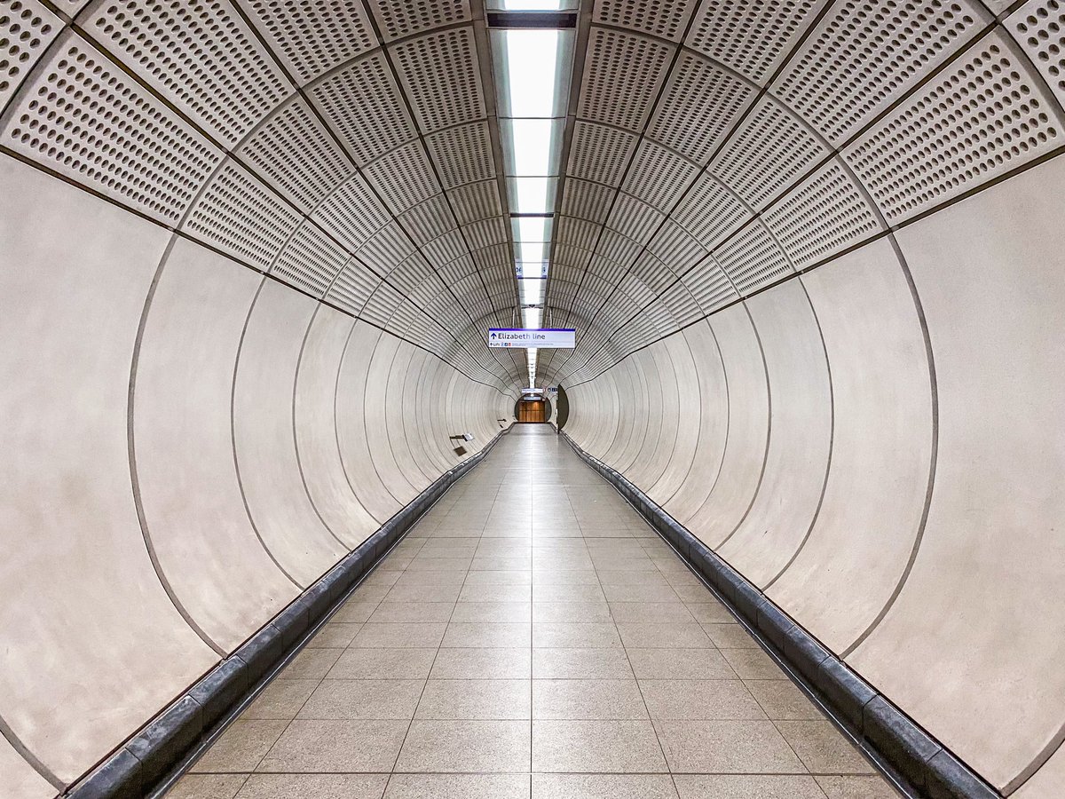 MrTimDunn's tweet photo. I’ve lived up in town for nearly 20 years because I love the energy, the buzz; but the Covid-era has shown me that our city silent has much beauty too. Tonight, with rail strikes, I imagine I’d hear a pin drop here in Moorgate’s Northern line to Elizabeth line platforms tunnels https://t.co/WkRGnhTZWe
