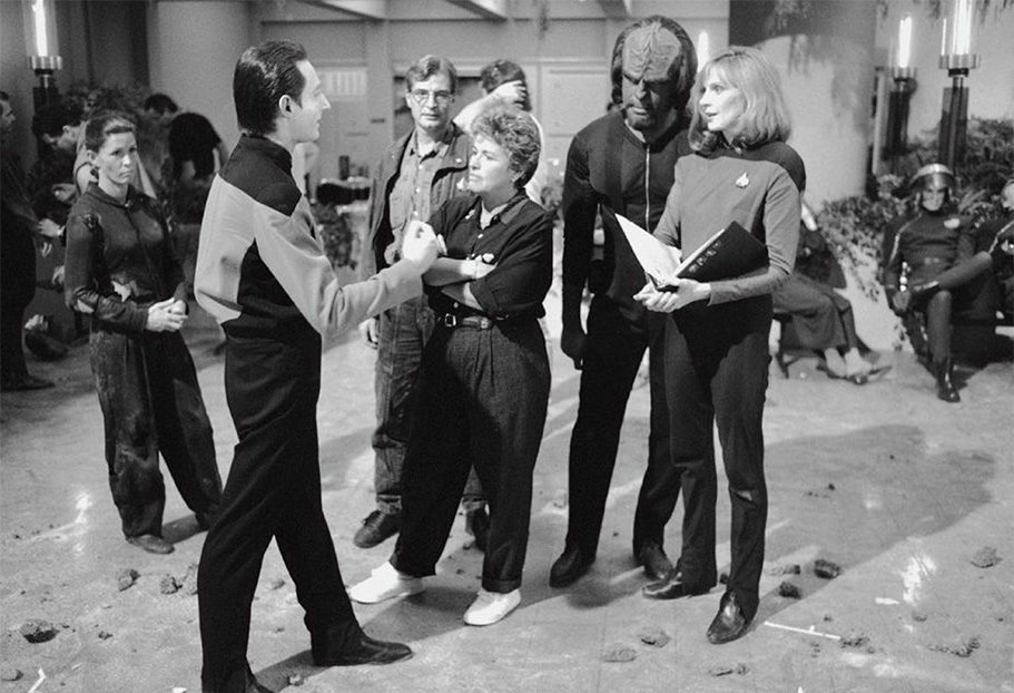 TrekCore's tweet image. Farewell to Gabrielle Beaumont, the first female director for the #StarTrek franchise -- she helmed such episodes as "Booby Trap," "The High Ground" (L pic), "Suddenly Human" (R pic)"Disaster," "Face of the Enemy," "Lower Decks," "In Purgatory's Shadow" and "Blink of an Eye."