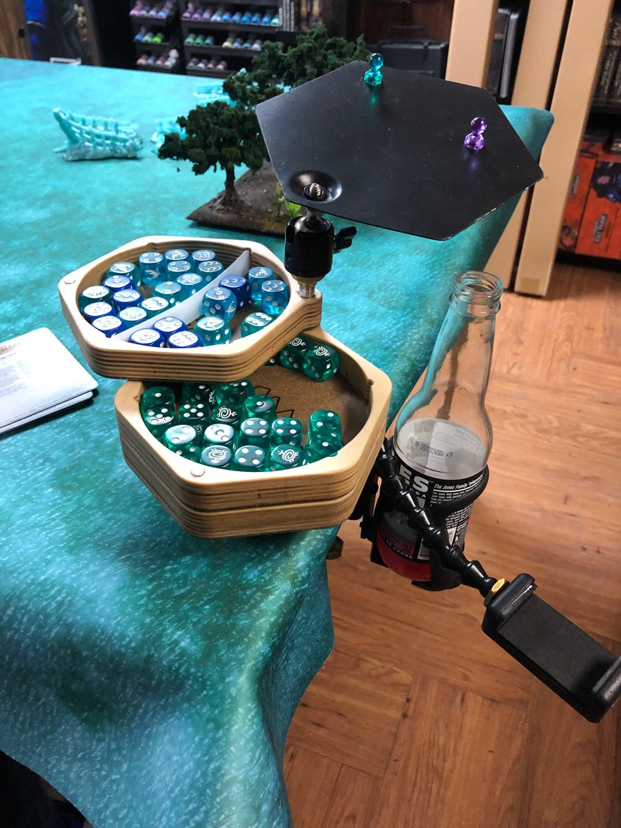AuthenticDunge1's tweet photo. Just got some new gear from a local crafter! The Game Butler is the answer for those “hold my beer” moments. It’s a dice tray, drink holder, phone holder and DM screen all rolled into one. Perfect for making space on crowded wargaming tables. And did I mention made locally ;) https://t.co/5pgThU3Uxq