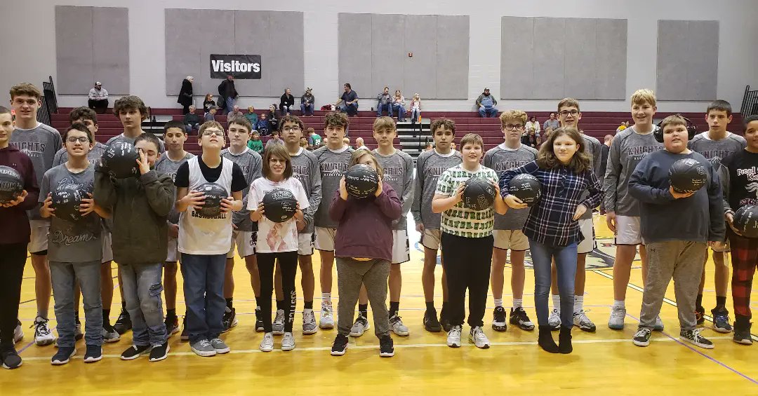 NCMS Adap PE recited the Pledge at boys bb game. 8th grade players then presented them with signed bballs. #ncmsunited
