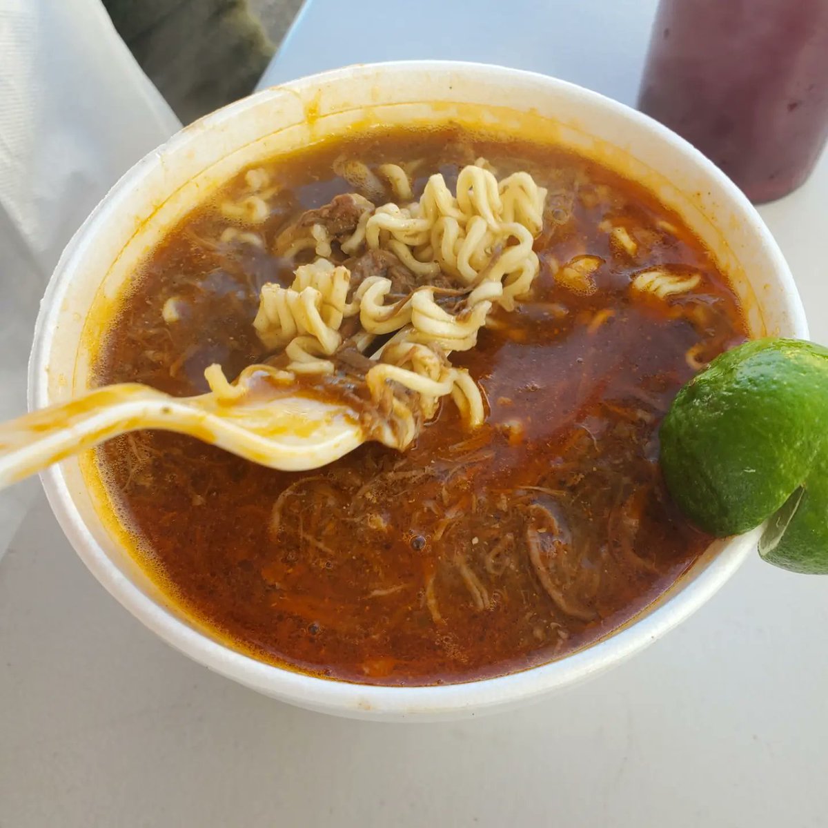 pasotours's tweet image. Think it was @LATACO or @GustavoArellano who I first saw this existed. But finally got to try Birria ramen on a quick trip to Tucson. Outrageously good. At first was disappointed it was top ramen style noodles but after was not sure it would be better with fresh noods.