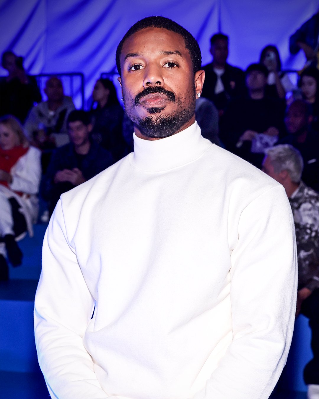 A man with a goatee and a turtle neck sweater photo – Man face