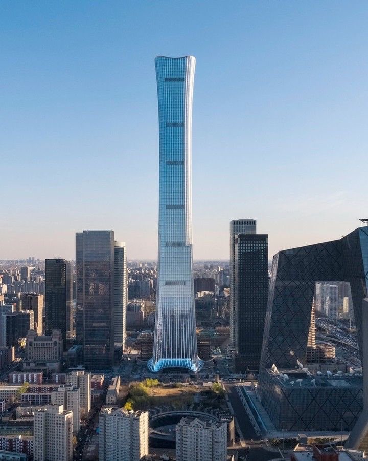 parametricarch's tweet photo. The CITIC Tower, designed by @KohnPedersenFox, is Beijing's tallest structure to date. The building got its impression from "Zun," a Bronze Age Chinese ritual vessel embracing a vase-like form.

📸 HG Esch + REX ZOU
📍Beijing, China 

#architect #towerdesign #skyscrapers https://t.co/mmbXBsNYEa