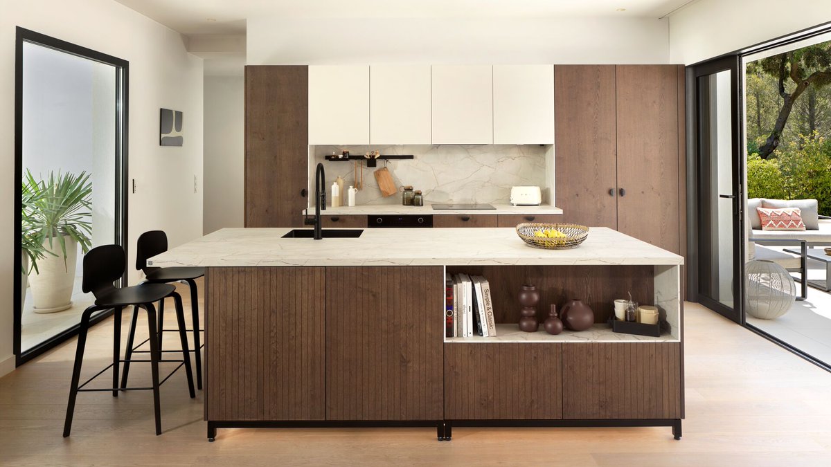Schmidt_Bath's tweet photo. Open to the living room, this wooden kitchen (Amber oak colour) is as functional as it is aesthetic. https://t.co/RLCTT7LI0R