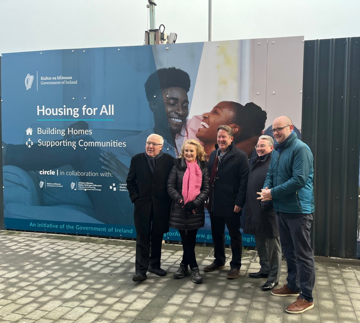 The Minister for Housing posts an image of him standing in front of an image saying 'housing for all' with 2 Africans laughing, why use an image of black people in a country with ~90% white people?