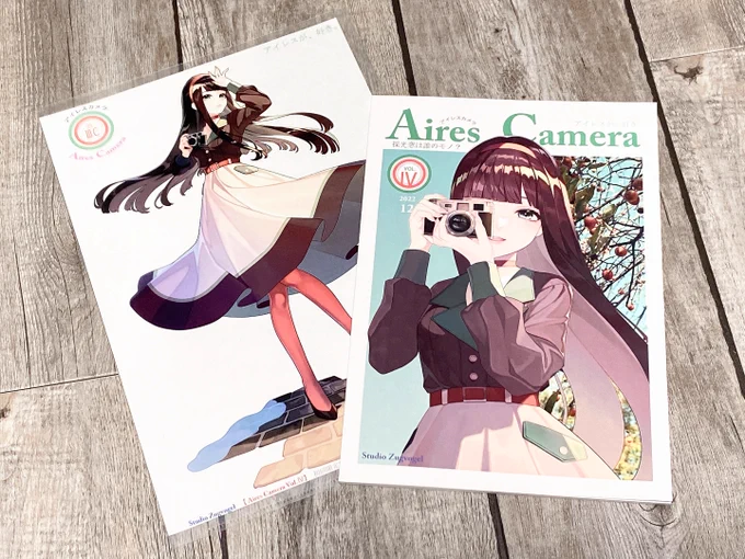 【お仕事】Studio Zugvogel様( )のC101新刊「アイレスカメラ」の表紙・挿絵を担当させていただきました～アナログ感たっぷりの写真がたくさん楽しめる一冊で最高でした…!よろしくお願いいたします～ 
