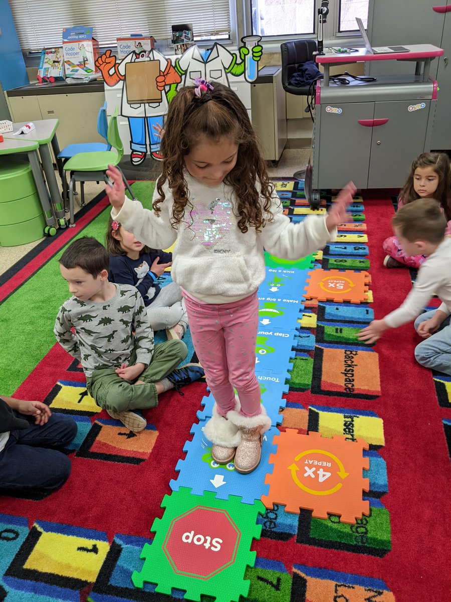 Students celebrated Computer Science week by playing a game called Code Hopper where they programmed their bodies to perform different movements.
