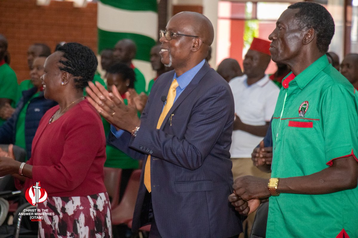 Senior Pastor Rev. Robin Mulunda praying  with KNUT Officials, during the 62nd KNUT Annual Delegates Conference today at CITAM Kisumu.