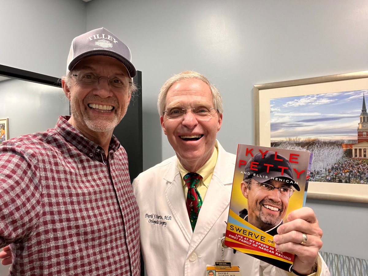 KPCharityRide's tweet photo. A minor finger injury led @kylepetty to make a recent visit to our #KPCharityRide Medical Team Member Dr. Martin (@DemonDeaconDoc)! And what did Dr. Martin have in his office...a copy of Kyle's book, of course! 👍 https://t.co/RHcrsCclAN