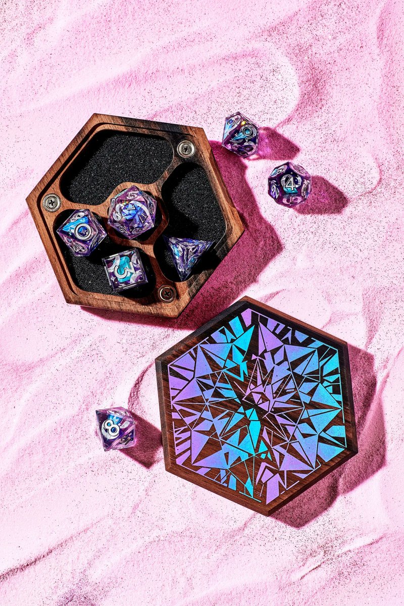 WyrmwoodGaming's tweet photo. Get ready for the launch day with @dispeldice on December 14th 2PM ET - The Elemental Collection. 🎉
💎Geode Dice Vault - strong and reliable element, expressed in hypnotic prism pattern engraved on our Cherry and inlaid Ebony wood selection. https://t.co/qTBT1gmkZm
