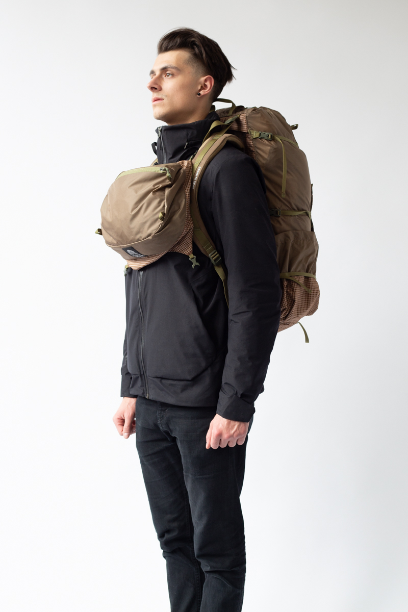 GraniteGearHQ's tweet photo. It’s a backpack, it’s a fanny pack, wait…. It’s a chest pack too? One of our favorite features on the Blaze and Crown3 60. 👀 Simply remove the lid to cut grams or clip it to your chest or hip belt. When it comes to snacks, chapstick, sunscreen, and maps... we like easy access! https://t.co/2TKKMKxBBm
