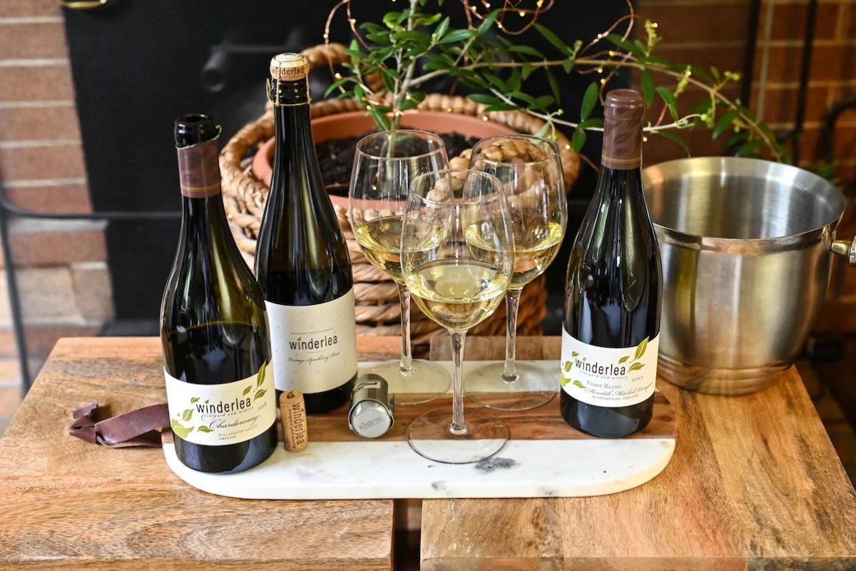 Celebrate the holiday season with a White Christmas from Winderlea Vineyard &amp; Winery! This festive collection of bubbles, Chardonnay, and Pinot blanc, is sure to delight any white wine lover. Place your order today at winderlea.com/product-catego….