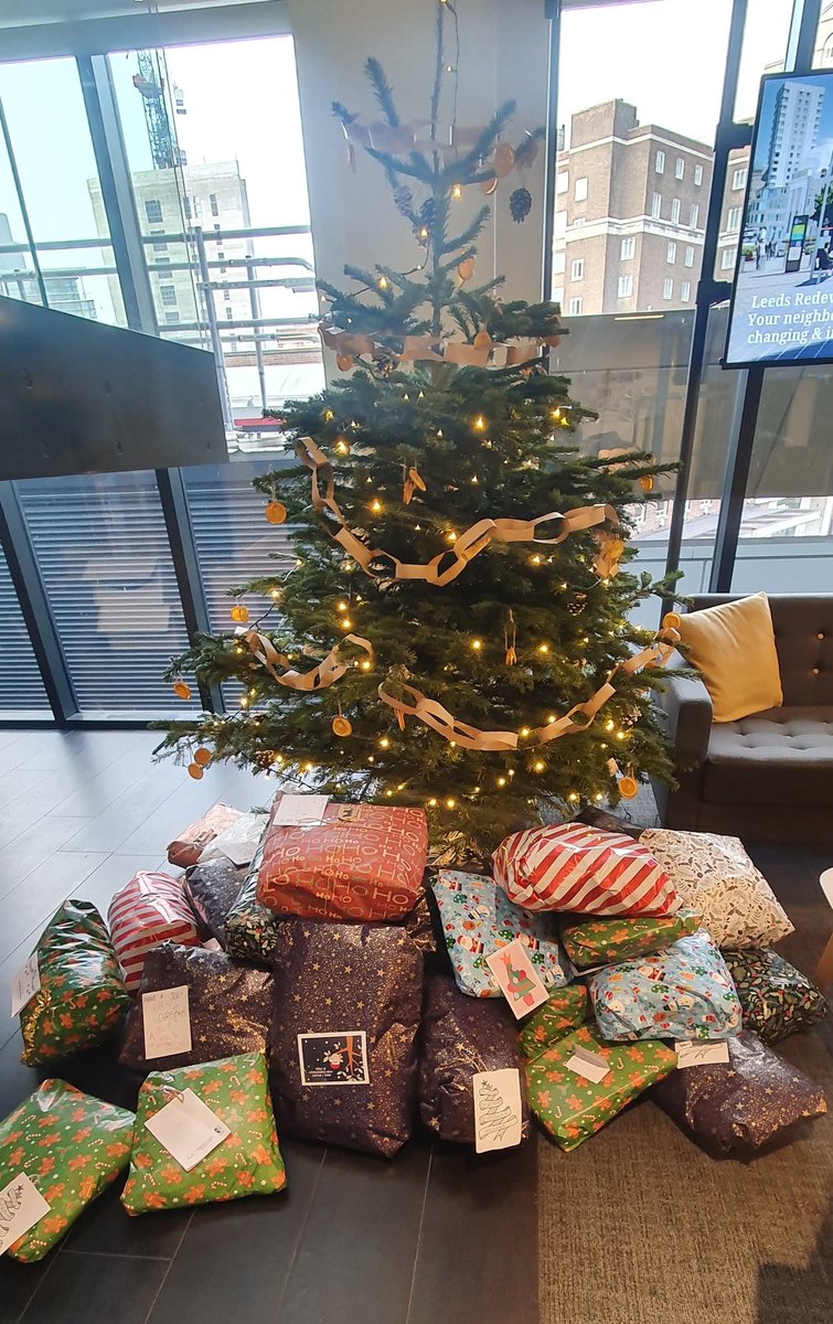 And that's a wrap! Well, wrapping party. We collected 160 gifts our wishing tree campaign across our <a href="/Bruntwood_UK/">Bruntwood</a> buildings in Leeds to donate to our charity partner <a href="/ZestLeeds/">Zest</a> tomorrow. Love our customers and community ❤ - they are the best! Just a few under the tree.