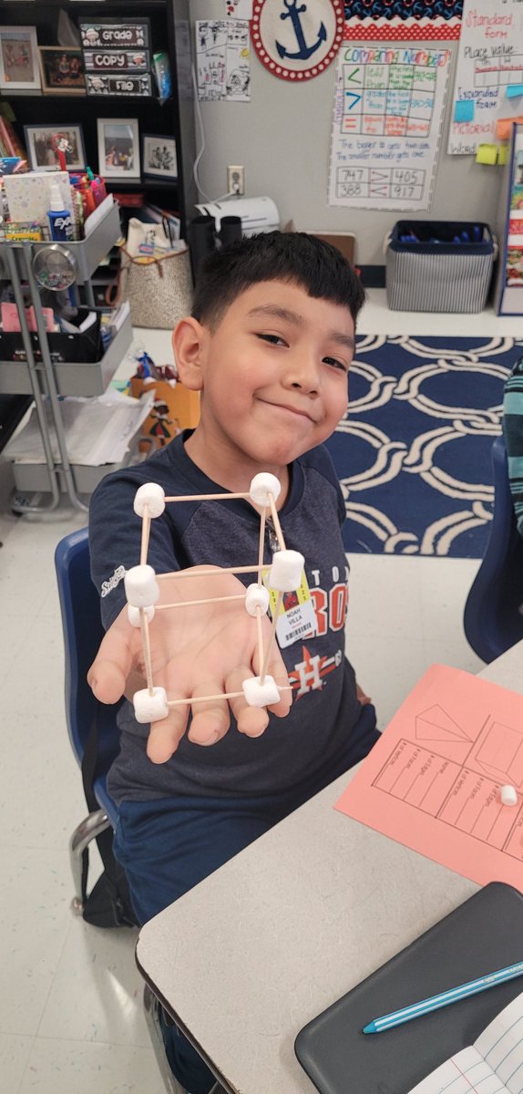 nic_bennettPISD's tweet photo. Started our Math lesson today with what's most important.. how many days till 🎄break! Then used toothpicks and marshmallows to form 3D shapes and discussed the attributes!❤️ #PISDmathchat @LauraBush_Elem https://t.co/xMTOoWm9tE