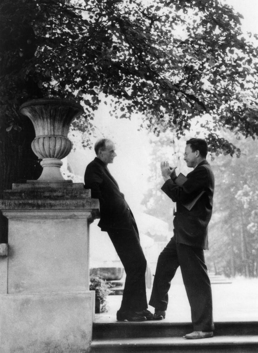 PhysInHistory's tweet photo. Richard Feynman in a conversation with his hero – physicist and Nobel laureate Paul Dirac, who is considered to be one of the pioneers of quantum mechanics, Warsaw c. 1963.

Both Dirac and Feynman have had significant contributions to QED. https://t.co/7Pt0F6V3j6