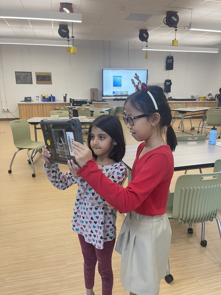 Ms_Bookmark_BPE's tweet photo. We found a plus to having prek and 4th grade in the library at the same time… 4th graders can help prek scan QR codes on the iPads! @Techtiffany4 @BPE_Broncos @LVE_Vikings https://t.co/YmWlgCzpVE