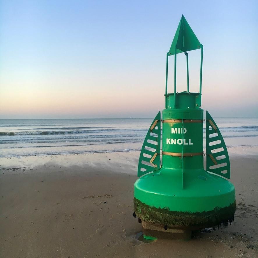 The mid knoll buoy from the Deben entrance has rejoined the EU. Found on a Belgian beach. :)