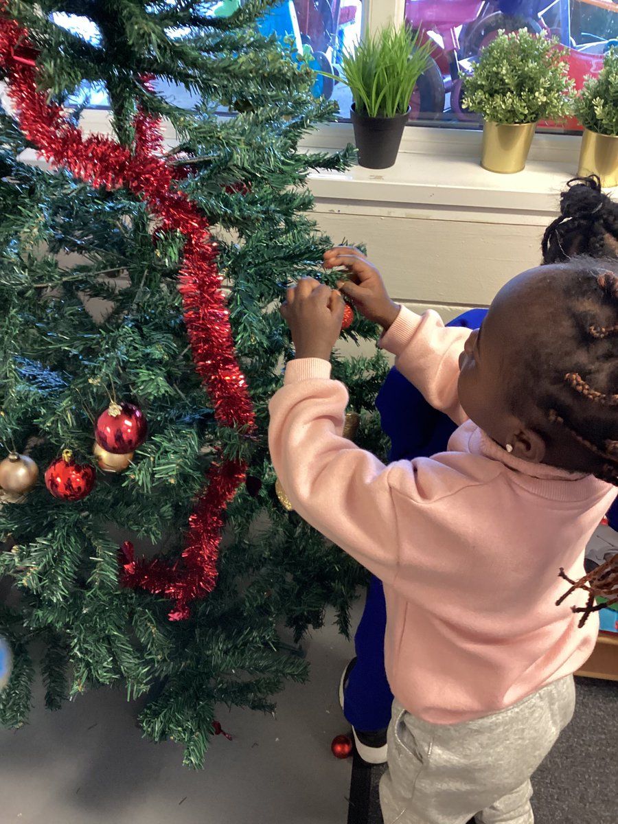 Nurserystm1's tweet photo. Decorating our Christmas tree. We used our fine motor skills to hang baubles and tinsel. #STMeyfs #STMutw #STMphysicaldevelopment https://t.co/LW3Y8bD3CQ
