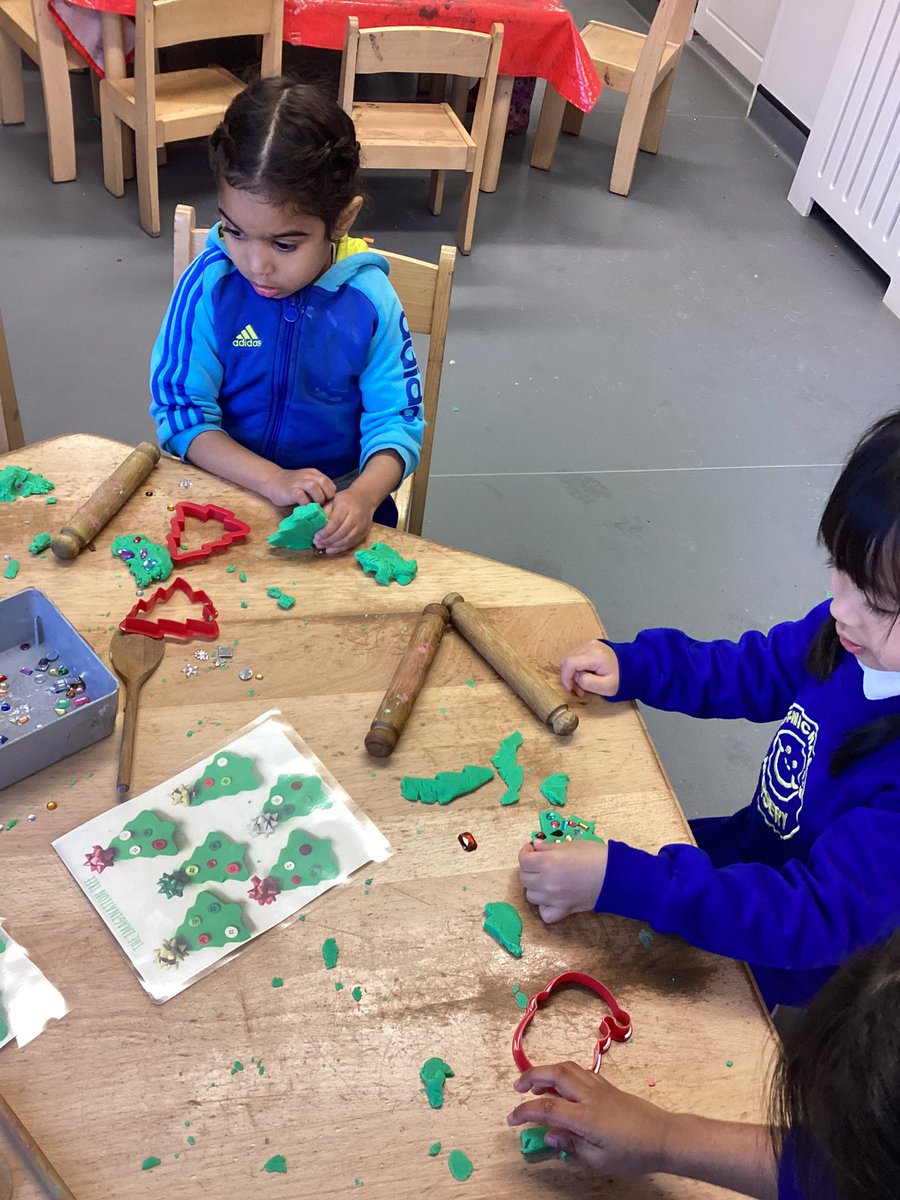 Nurserystm1's tweet photo. Making Christmas trees out of play-dough. We counted how many gems we were putting on the tree. #STMeyfs #STMphysicaldevelopment #STMmaths https://t.co/TXOhfDG6Vz