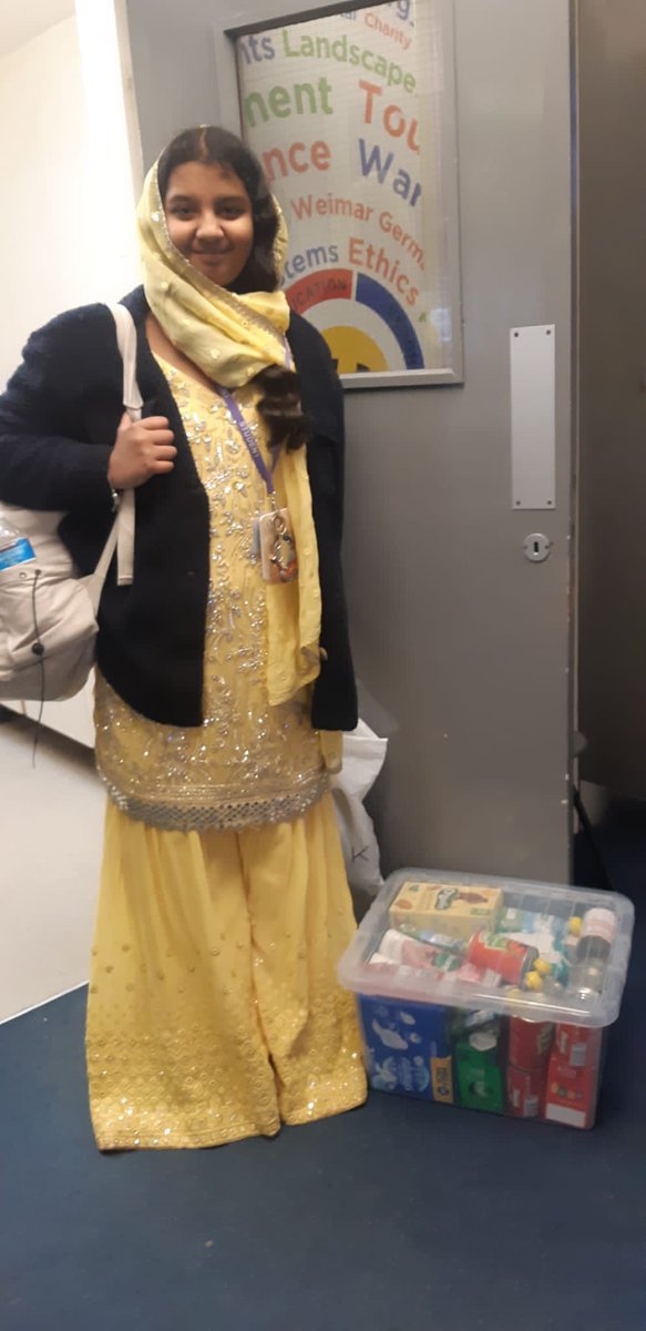 HolyheadHums's tweet photo. We are so proud of Priya in year 8 for being a role model in her charitable giving to the food drive and her celebration of her culture on such an exciting day 🎉 thank you to everyone else who has donated so far as well ❤️ @holyhead_school https://t.co/bDXYkcY9Q2