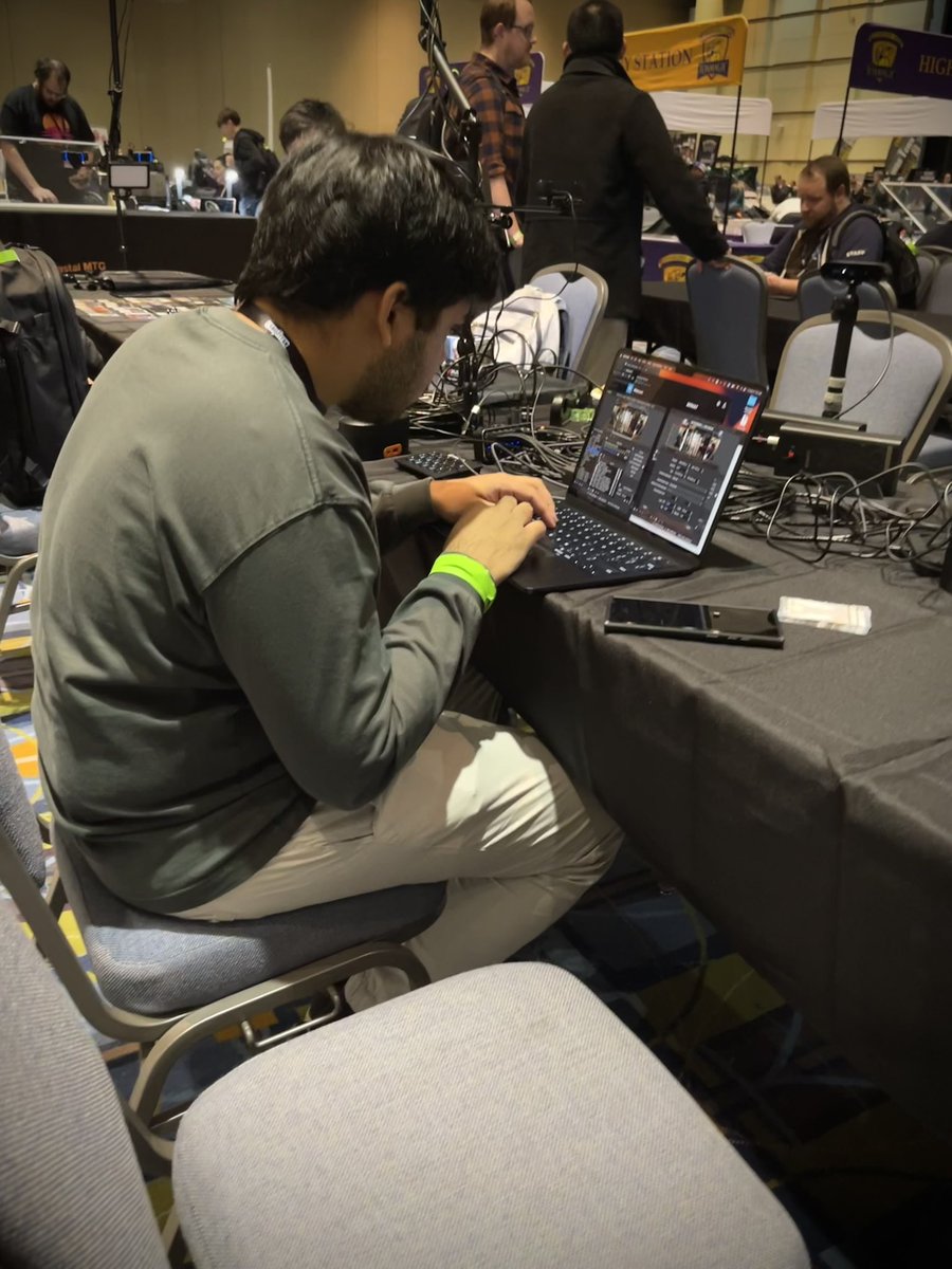 RolandMTG's tweet image. Let me tell you about @anzidmtg. This guy spent 4 straight days huddled in this position. 4 straight days quarterbacking the live coverage for Eternal Weekend. That’s also 4 straight days of not playing a single game of MTG, while we were jammin. He’s the real MVP of Eternal MTG.